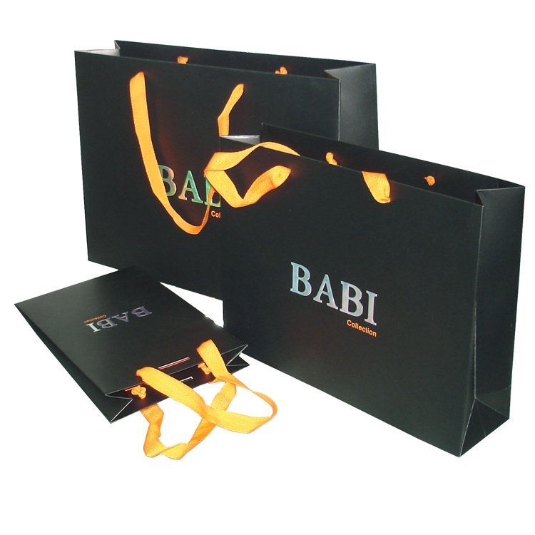 Shopping paper bag with rope handles for clothing packaging-www.hoocing.com